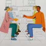 Two people chatting at Talkin' tables